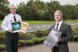 PSNI and head of NI Cyber security centre holding advice guide